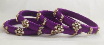 Grab This Very Pretty Set Of Four Bangles To Pair Up With Your Ethnic Wear, Also You Can Pair It Up With Same Or Any Contrasting Colored Attire. This Pretty set Is Available In All Sizes. 