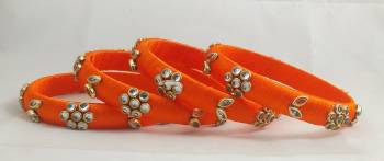 Grab This Very Pretty Set Of Four Bangles To Pair Up With Your Ethnic Wear, Also You Can Pair It Up With Same Or Any Contrasting Colored Attire. This Pretty set Is Available In All Sizes. 