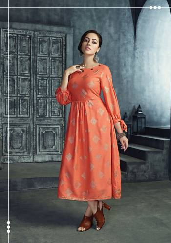 Grab This Designer Readymade Kurti In Orange Color Fabricated On Rayon. This Pretty Kurti Is Light In Weight And Easy To Carry All Day Long. 