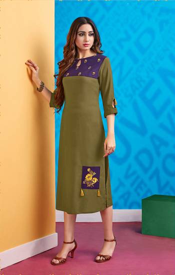 One Of The Most Running Shade Is Here With This Readymade Kurti In Olive Green And Violet Color. This Kurti Is Fabricated On Rayon Which Is Soft Towards Skin And Easy To Carry All Day Long. 