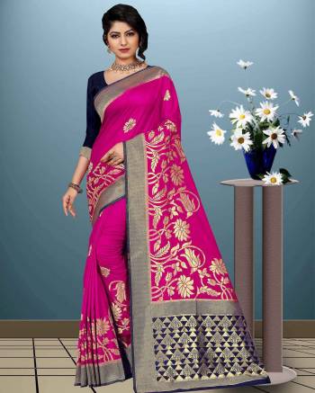 Grab This Designer Saree For The Upcoming Festive Season. This Saree Is Fabricated On Moonga Art Silk Paired With Art Silk Fabricated Blouse. This Rich Silk Based Saree And Its Weave Will Earn You Lots Of Compliments From Onlookers. 