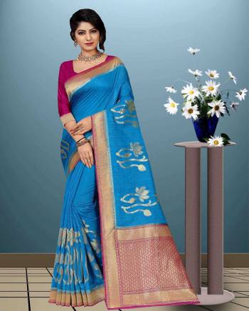 Grab This Designer Saree For The Upcoming Festive Season. This Saree Is Fabricated On Moonga Art Silk Paired With Art Silk Fabricated Blouse. This Rich Silk Based Saree And Its Weave Will Earn You Lots Of Compliments From Onlookers. 