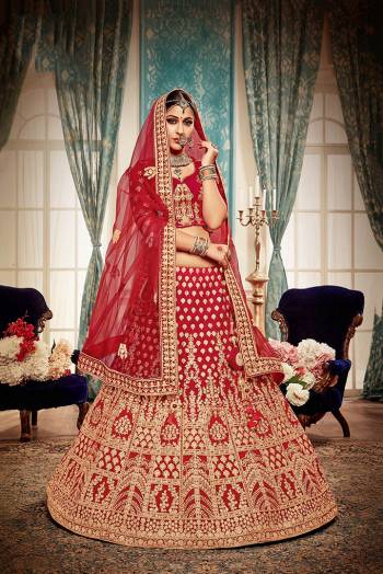 Here Is A Perfect Bridal Look For You With This Heavy designer Lehenga Choli In Red Color. This Lehenga Choli Is Velvet Based Paired With Net Fabricated Dupatta.Its Fabric Also Ensures Superb Comfort Throughout The Gala