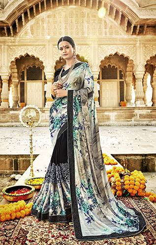 You Will Definitely Earn Lots Of Compliments In This Unique Patterned Designer Saree In Grey And Black Color Paired With Black Colored Blouse. This Saree Is Fabricated On Satin Georgette And Net Paired With Art Silk Blouse. Buy This Designer Saree Now. 