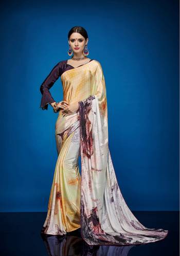 Rich And Elegant Looking Designer Printed Saree Is Here Fabricated On Crepe Silk Paired With Crepe Silk Fabricated Blouse. It Is Beautified With Abstract Prints All Over It.