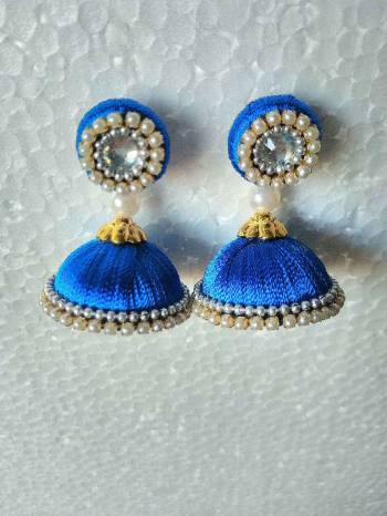 Grab This Beautiful Earrings Set In Jhumki Style Which Can Be Paired With Any Contrasting Or Same Colored Traditional Attire. Made With Resham Thread And Beautified With Pearl Work.