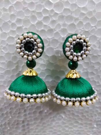 Grab This Beautiful Earrings Set In Jhumki Style Which Can Be Paired With Any Contrasting Or Same Colored Traditional Attire. Made With Resham Thread And Beautified With Pearl Work.