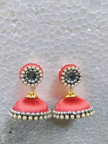 Grab This Beautiful Earrings Set In Jhumki Style Which Can Be Paired With Any Contrasting Or Same Colored Traditional Attire. Made With Resham Thread And Beautified With Pearl Work.