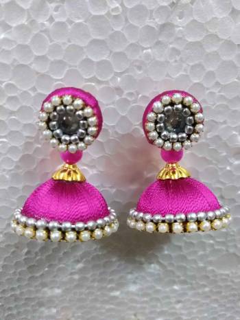 Grab This Beautiful Earrings Set In Jhumki Style Which Can Be Paired With Any Contrasting Or Same Colored Traditional Attire. Made With Resham Thread And Beautified With Pearl Work.