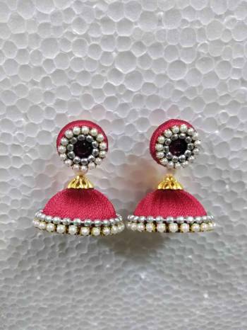 Grab This Beautiful Earrings Set In Jhumki Style Which Can Be Paired With Any Contrasting Or Same Colored Traditional Attire. Made With Resham Thread And Beautified With Pearl Work.