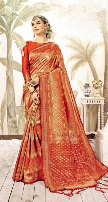 This Festive Season, Look The Amazing Of All In This Silk Based Red And Gold Colored Saree Paired With Red Colored Blouse. This Saree Is Fabricated On Kanjivaram Art Silk Paired With Art Silk Fabricated Blouse. 