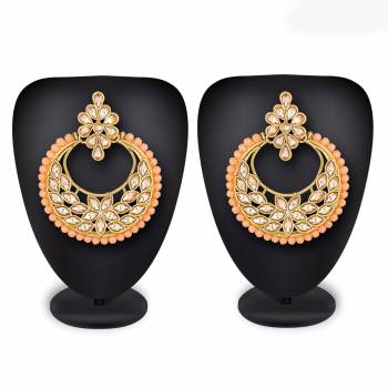 Grab This Beautiful And Attractive Pair Of Heavy Earrings Set In?Golden Color. This Pretty Pair Is Beautified With Stone Work And Can Be Paired With Any Colored Traditional Attire. Buy Now.