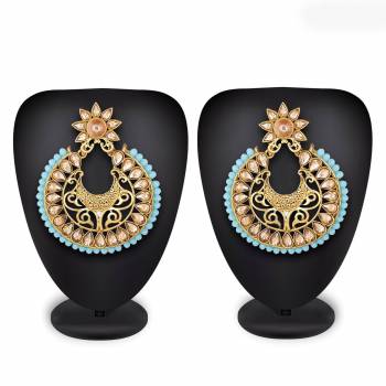 Grab This Beautiful And Attractive Pair Of Heavy Earrings Set In?Golden Color. This Pretty Pair Is Beautified With Stone Work And Can Be Paired With Any Colored Traditional Attire. Buy Now.