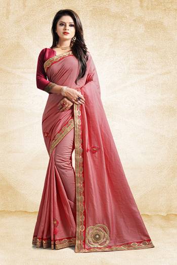 Here Is A Rich And Elegant Looking Designer Saree In Pink Color Paired With Contrasting Dark Pink Colored Blouse. This Saree And Blouse Are Silk Based With A Very Pretty Color Pallete Which Earn You Lots Of Compliments From Onlookers. 