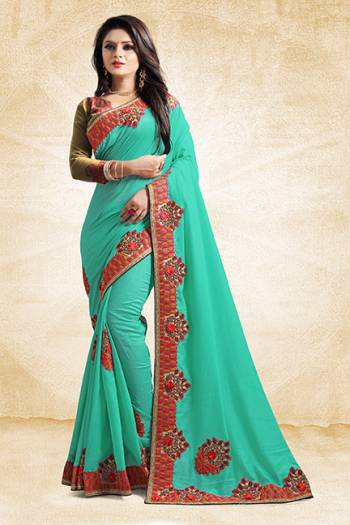 Add This Pretty Designer Saree To Your Wardrobe In Sea Green Color Paired With Golden Colored Blouse. This Saree And Blouse Are Silk Based Beautified With Heavy Embroidered Lace Border. Buy Now.