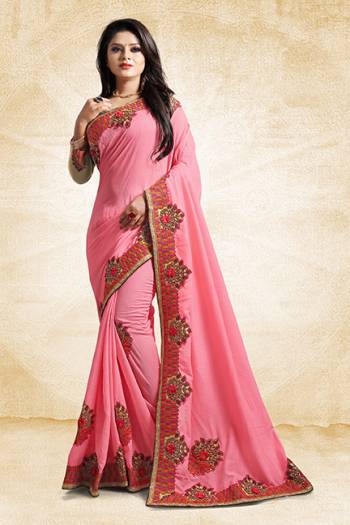 Add This Pretty Designer Saree To Your Wardrobe In Pink Color Paired With Golden Colored Blouse. This Saree And Blouse Are Silk Based Beautified With Heavy Embroidered Lace Border. Buy Now.