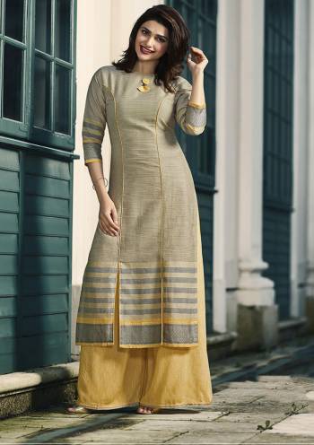 Rich And Elegant Looking Readymade Plazzo Set IS Here In Grey Colored Top Paired With Yellow Colored Plazzo. Its Kurti And Plazzo Are Fabricated On Rayon Beautified With Prints. Buy Now.