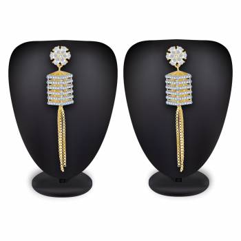 Rich And Elegant Looking Designer Earring Set Is Here In Golden Color Beautified With Stone Work. It IS Light Weight And Can Be Paired With Any Colored Attire. 