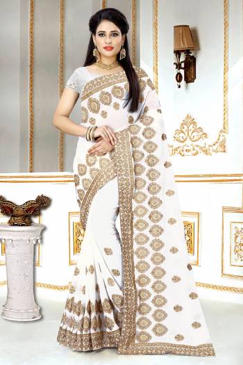 Grab This Beautiful Heavy Designer Saree In White Color. This Saree And Blouse Are Fabricated On Georgette Beautified Heavy Jari Embroidery And Stone Work. Buy Now.