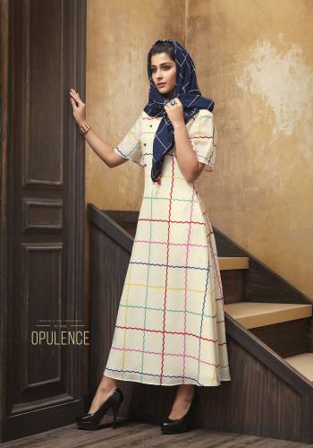 Simple And Elegant Looking Readymade Designer Kurti Is Here In Off-White Color Paired With Navy Blue Colored Scarf. This Pretty Kurti Is Muslin Fabricated Paired With Rayon Fabricated Embroidered Scarf, Also It Is Available In All Regular Sizes. 