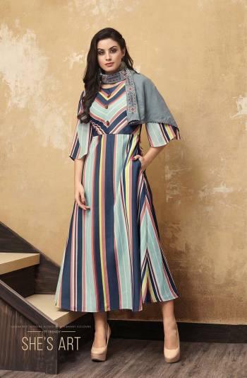 Grab This Pretty Lining Printed Readymade Designer Kurti In Multi Color Paired With A Very Pretty Steel Blue Colored Embroidered Scarf. This Kurti Is Fabricated O Muslin Paired With Rayon Fabricated Scarf. Buy Now.