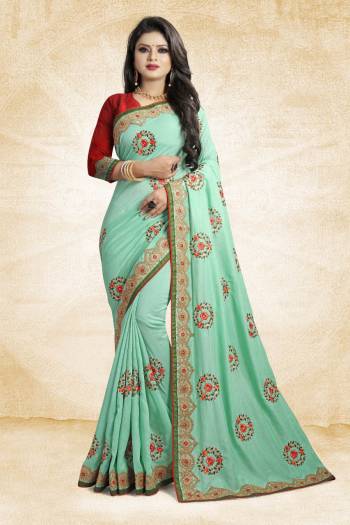 Look Pretty In This Rich And Elegant Looking Designer Saree In Sea Green Color Paired With Contarsting Maroon Colored Blouse. This Saree And Blouse are Fabricated Silk Beautified With Embroidered Butti Work. Buy This Rich Looking Saree With Pretty Color Pallete Now.