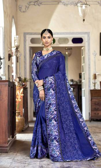 Shine Bright In This Designer Royal Blue Color Paired With Royal Blue Colored Blouse. This Saree Is Fabricated On Georgette Paired With Satin Silk Fabricated Blouse. It Is Beautified With Floral Prints And Embroidery. 