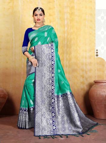 Grab This Pretty Saree For The Upcoming Festive Season With This Heavy Woven Saree Fabricated In Cotton Silk Jacquard Paired With Art Silk Fabricated Blouse. This Saree And Blouse Are Light Weight And Easy To Carry Throughout The Gala.