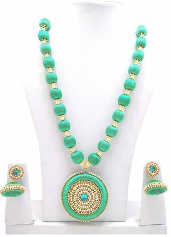 Give An Enhanced Look To Your Ethnic Attire Pairing It Up With This Attractive Necklace Set Made With Resham Threads And Beautified With Stone Work. Also It Comes With A Pretty Pair Of Earrings. This Set Can Be Paired With Same Or Contrasting Colored Attire. Buy This Now. 