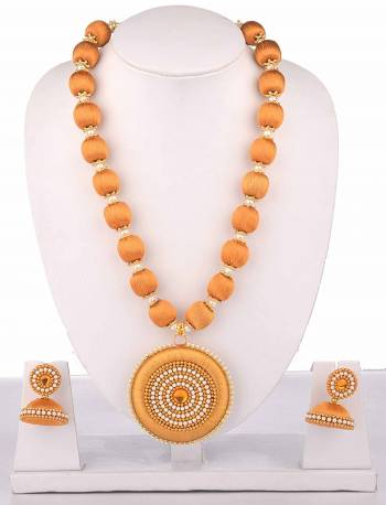 Give An Enhanced Look To Your Ethnic Attire Pairing It Up With This Attractive Necklace Set Made With Resham Threads And Beautified With Stone Work. Also It Comes With A Pretty Pair Of Earrings. This Set Can Be Paired With Same Or Contrasting Colored Attire. Buy This Now. 