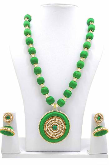 Give An Enhanced Look To Your Ethnic Attire Pairing It Up With This Attractive Necklace Set Made With Resham Threads And Beautified With Stone Work. Also It Comes With A Pretty Pair Of Earrings. This Set Can Be Paired With Same Or Contrasting Colored Attire. Buy This Now. 