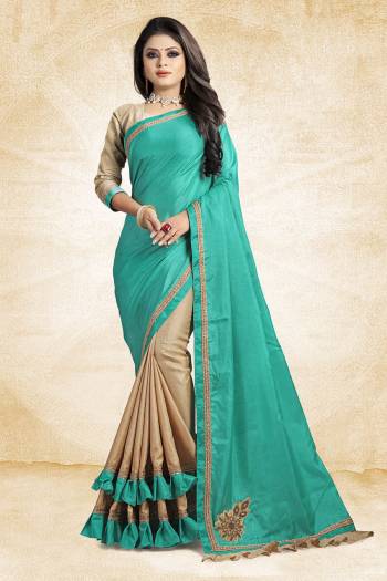 For A Rich And Elegant Look, Grab This Designer Saree In Blue And Beige Color Paired With Beige Colored Blouse. This Saree And Blouse Are Silk Based Beautified with Embroidered Patch Work And Lace Border. Buy Now.