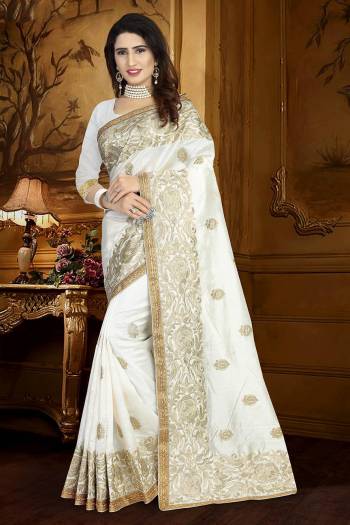 Catch All The Limelight Wearing This Heavy Designer Saree In White Color Paired With White Colored Blouse. This Saree And Blouse Are Fabricated On Art Silk Beautified With Resham Embroidery And Lace Border. 