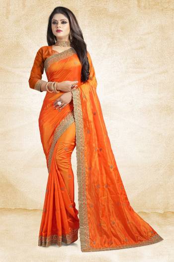 Shine Bright Wearing This Designer Saree In Orange Color Paired With Orange Colored Blouse. This Saree Is Fabricated On Paper Art Silk Paired With Art Silk Fabricated Blouse. It Is Beautified With Embroidered Lace Border And Butti All Over. 