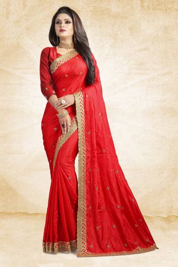 Shine Bright Wearing This Designer Saree In Red Color Paired With Red Colored Blouse. This Saree Is Fabricated On Paper Art Silk Paired With Art Silk Fabricated Blouse. It Is Beautified With Embroidered Lace Border And Butti All Over. 