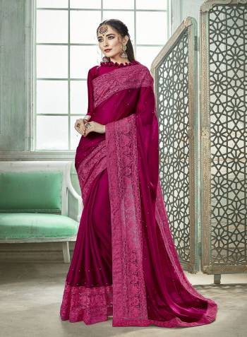 Here Is A Very Pretty And Light Weight Saree In Dark Pink Color Paired With Dark Pink Colored Blouse. This Saree And Blouse Are Fabricated On Silk Georgette Beautified With Thread Embroidery And Moti Work. Buy This Designer Saree Now.