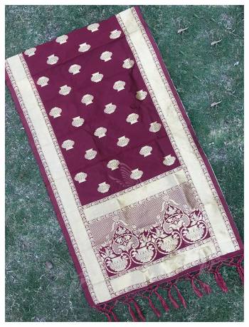 For A Proper Traditional Look, Pair Up Your Simple Attire With This Trendy Banarasi Art Silk Fabricated Dupatta. It Is Beautified With Weave All Over. Also It Is Light In Weight And Easy To Carry All Day Long. 