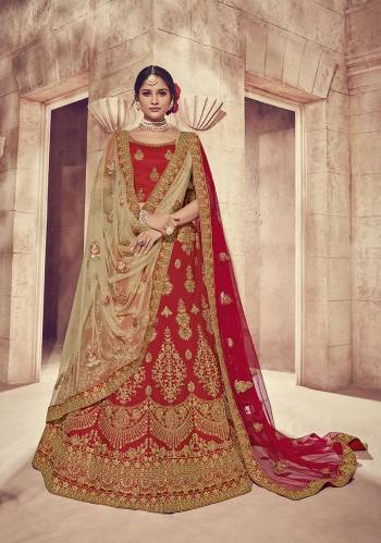 Here Is A Perfect Bridal Look For You With This Heavy designer Lehenga Choli In Red Color. This Lehenga Choli Is Silk Based Paired With Net Fabricated Dupatta Two Dupattas, One In Red And Another In Beige Color. Its Fabric Also Ensures Superb Comfort Throughout The Gala. 