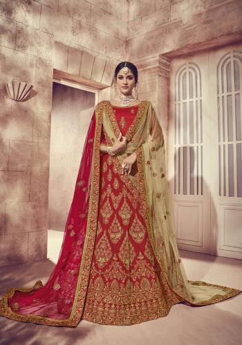 Here Is A Perfect Bridal Look For You With This Heavy designer Lehenga Choli In Red Color. This Lehenga Choli Is Silk Based Paired With Net Fabricated Dupatta Two Dupattas, One In Red And Another In Beige Color. Its Fabric Also Ensures Superb Comfort Throughout The Gala. 