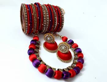 Grab This Beautiful Set Of Necklace Which Comes With A very Pretty Pair Of Earrings And Bangles Set. This Pretty set Is Made With Resham Thread Beautified With Stone Work. It Can Be Paired With Any Same Or Contrasting Colored Ethnic Attire. 