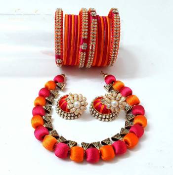 Grab This Beautiful Set Of Necklace Which Comes With A very Pretty Pair Of Earrings And Bangles Set. This Pretty set Is Made With Resham Thread Beautified With Stone Work. It Can Be Paired With Any Same Or Contrasting Colored Ethnic Attire. 