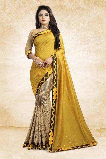 Here Is A Designer Saree In Unique Skirt Pallu Pattern. This Saree Is In Yellow And Beige Color Paired With beige Colored Blouse. This Saree Is Fabricated On Jacquard Silk Paired With Art Silk Fabricated Blouse. Its Rich Silk Fabric Earn You Lots Of Compliments From Onlookers. 