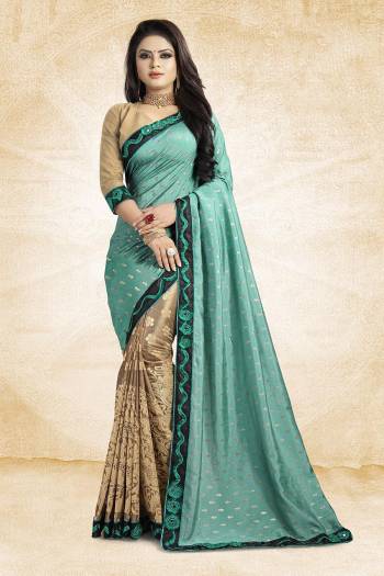 Here Is A Designer Saree In Unique Skirt Pallu Pattern. This Saree Is In Blue And Beige Color Paired With beige Colored Blouse. This Saree Is Fabricated On Jacquard Silk Paired With Art Silk Fabricated Blouse. Its Rich Silk Fabric Earn You Lots Of Compliments From Onlookers. 