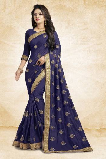 Look Pretty In This Lovely Designer Saree In Navy Blue Color Paired With Navy Blue Colored Blouse. This Pretty Embroidered Saree In Fabricated On Vichitra Silk Paired With Art Silk Fabricated Blouse. It Has Jari Embroidery With Stone Work Giving The Saree An Attractive Look.