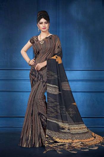 Add This Pretty Saree For your Semi-Casual Wear With Digital Prints All Over. This Saree And Blouse Are Fabricated On Art Silk Which Ensures Superb Comfort All Day Long.