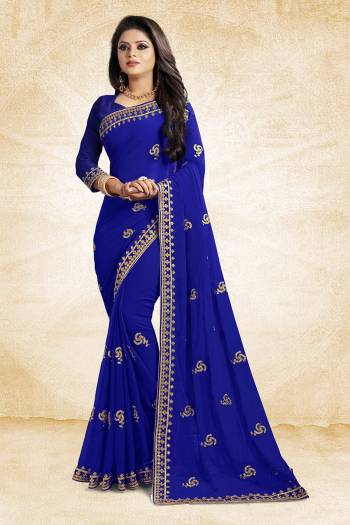 This Festive Season, Look Elegant With This Light Weight Saree In Royal Blue Color Paired With Royal Blue Colored Blouse. This Saree Is Fabricated On Georgette Paired With Art Silk Fabricated Blouse. It Is Beautified With Embroidered Butti And Lace Border. 