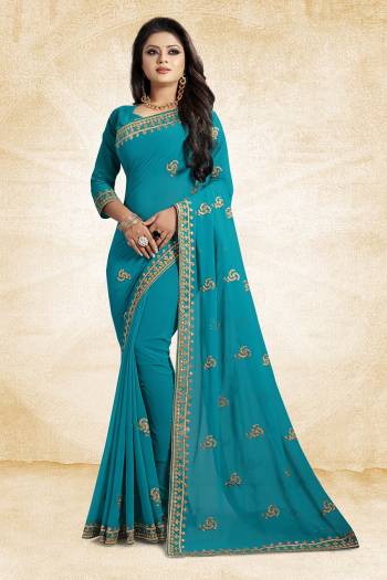 This Festive Season, Look Elegant With This Light Weight Saree In Blue Color Paired With Blue Colored Blouse. This Saree Is Fabricated On Georgette Paired With Art Silk Fabricated Blouse. It Is Beautified With Embroidered Butti And Lace Border. 