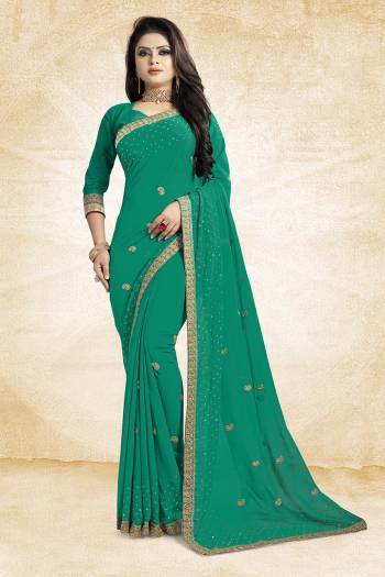 This Festive Season, Look Elegant With This Light Weight Saree In Sea Green Color Paired With Sea Green Colored Blouse. This Saree Is Fabricated On Georgette Paired With Art Silk Fabricated Blouse. It Is Beautified With Embroidered Butti And Lace Border. 