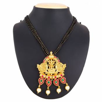 Grab This Heavy Three Chained Magalsutra With A Heavy Designer Pendant. This Mangalsutra Can Be Paired With Any Colored Traditional Attire. Buy Now.