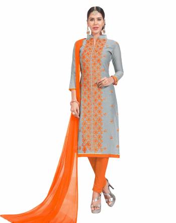 Add This Pretty Dress Material To Your Wardrobe And Get This Stitched As Per Your Desired Comfort. Its Top IS Grey Color Paired With Contrasting Orange Colored Bottom And Dupatta. Buy This Now.